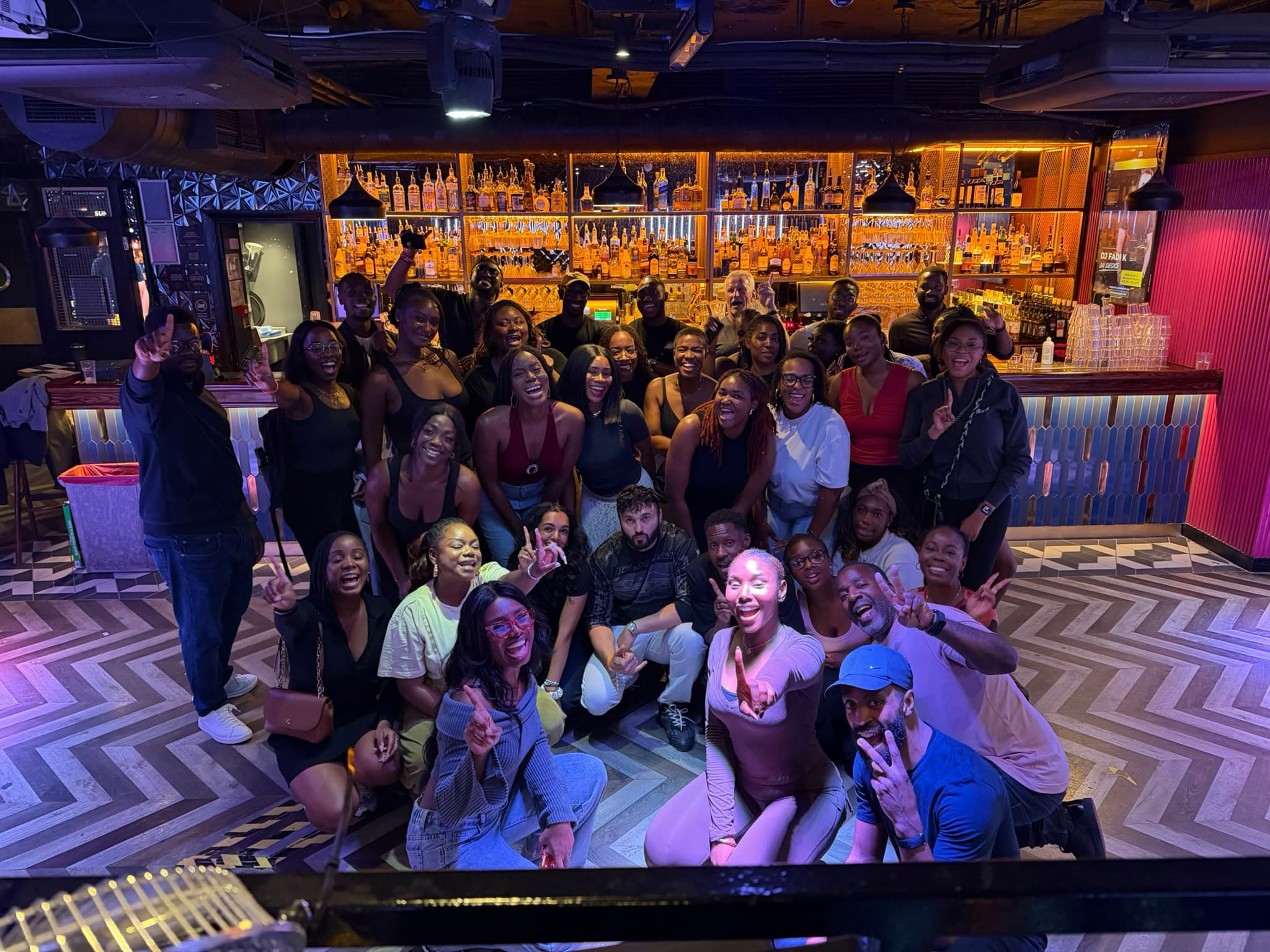 OnePercentNow community members smiling together at the Kizomba Social